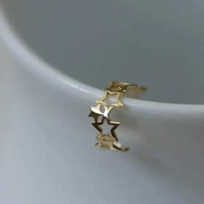 Earcuff estrellas gold