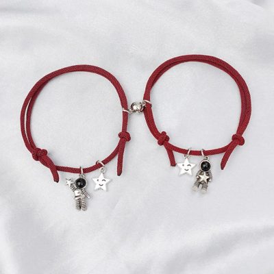 Pulseras tu y yo de astronautas magnéticas
