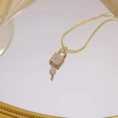 Collar candado y llave dorado - Imagen 2