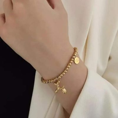Pulsera de perrito elástica dorada - Imagen 3