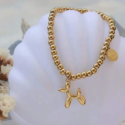 Pulsera de perrito elástica dorada - Imagen 5