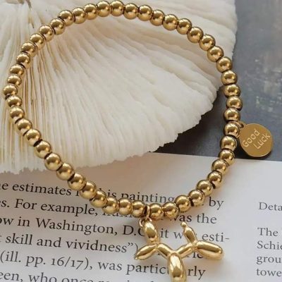 Pulsera de perrito elástica dorada - Imagen 4