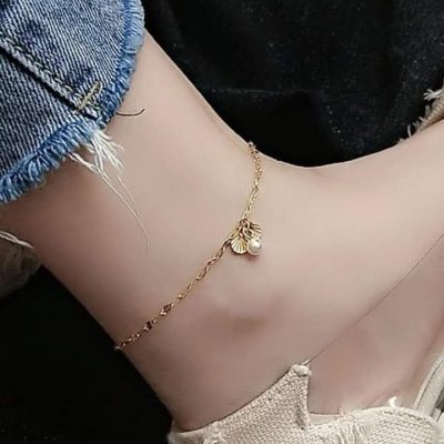 Tobillera de conchita y perla dorada