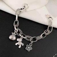 Pulsera link ponny, flor y bolsita