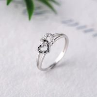 Anillo 2 corazones B/N plata 925
